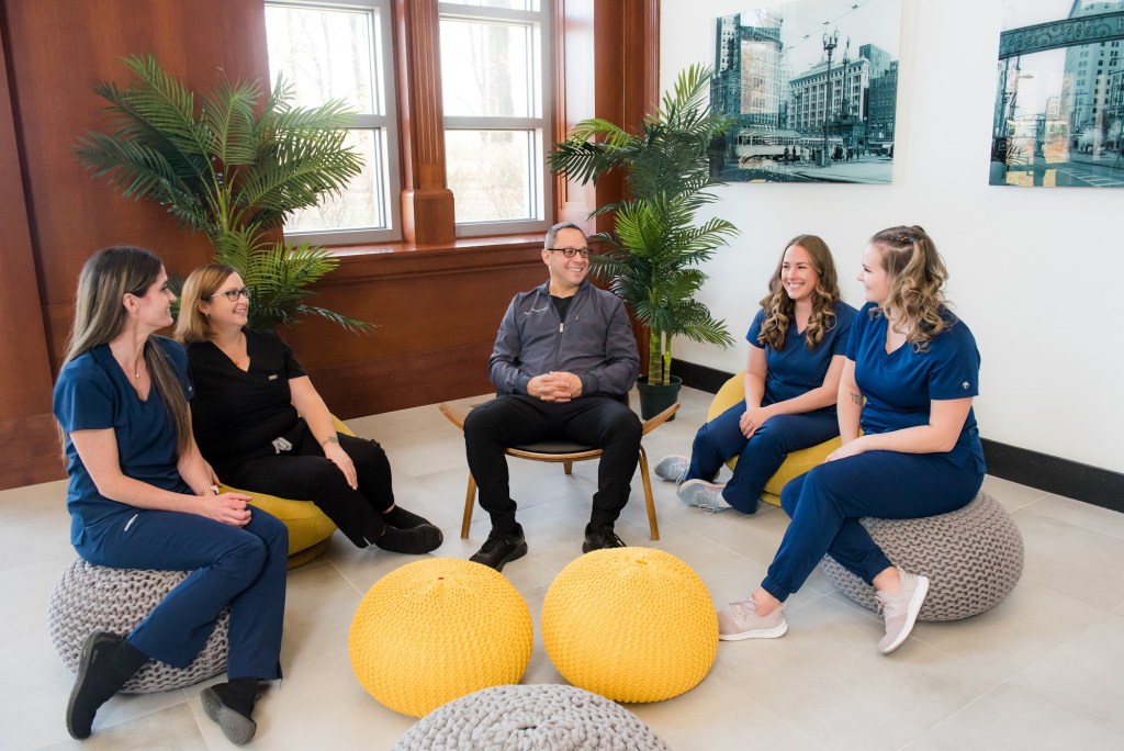 Staff sitting in circle
