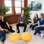 Staff sitting in circle